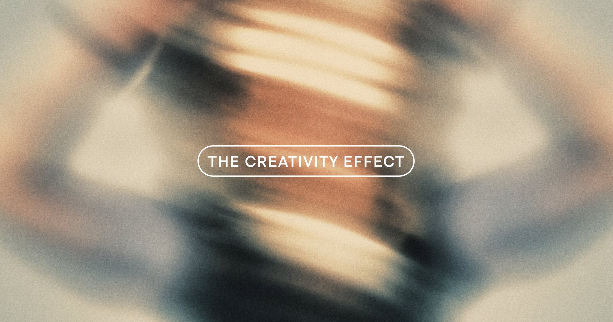 Blurred abstract background with the text 'The Creativity Effect' centered in white.