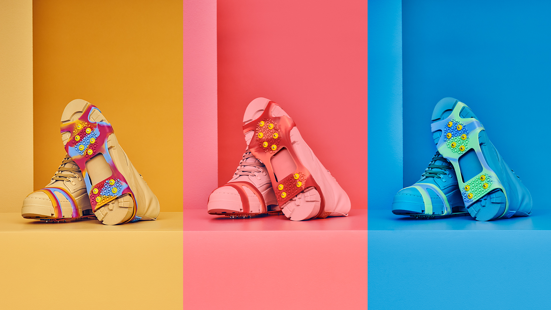 Three sneakers on colorful backgrounds, each equipped with colorful traction devices. From left: beige, pink, and blue sneakers.